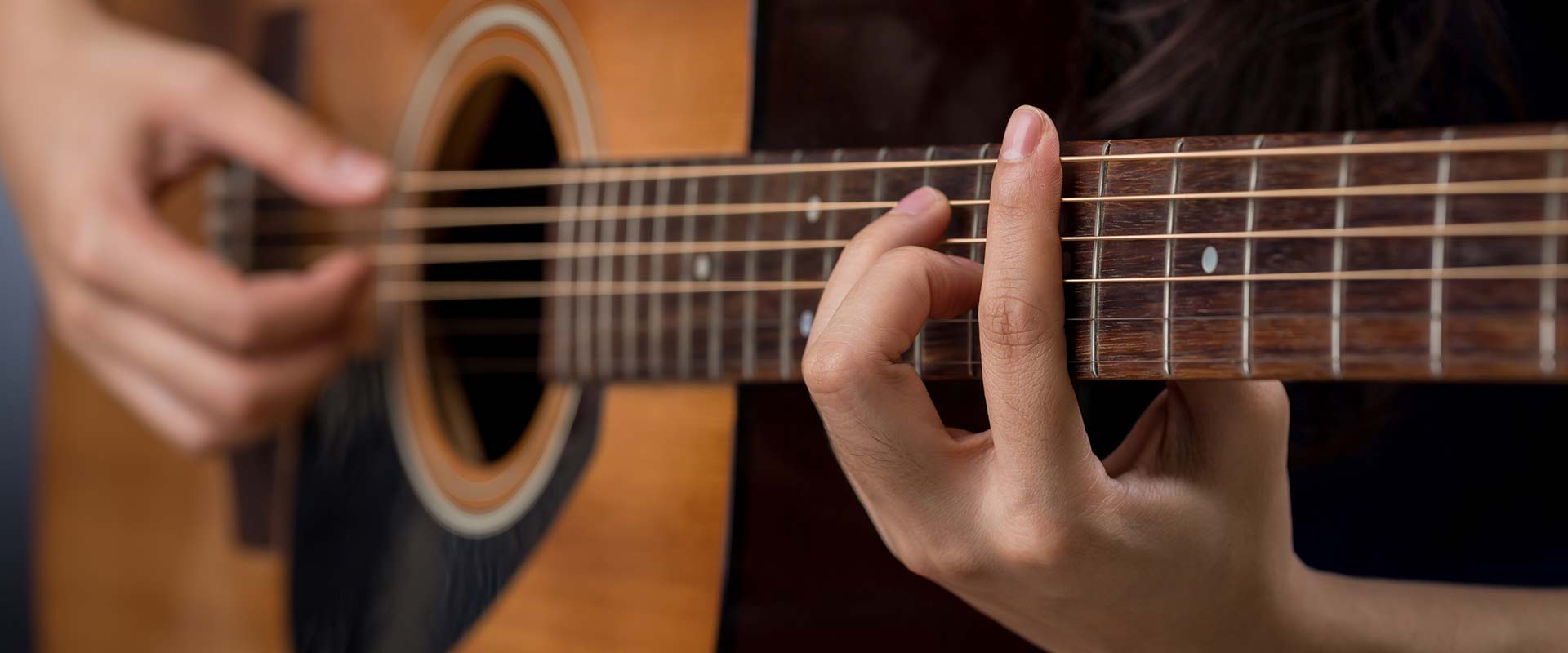playing guitar with cut fingers